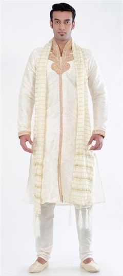 White and Off White color Kurta Pyjamas in Art Dupion Silk fabric with Border, Cut Dana, Patch, Stone, Thread work : 11439