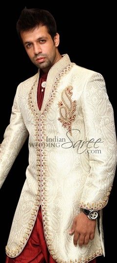 12244: White and Off White color Sherwani in Brocade fabric with Zircon work