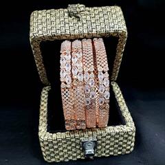 Beige and Brown color Bangles in Metal Alloy studded with CZ Diamond & Gold Rodium Polish : 1640803