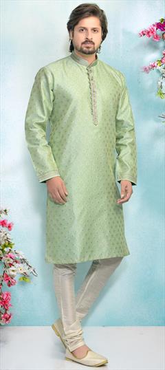 Green color Kurta Pyjamas in Jacquard fabric with Weaving work : 1703082