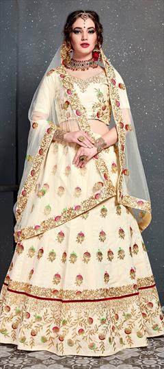 Traditional White and Off White color Lehenga in Art Silk fabric with A Line Embroidered, Stone, Thread, Zari work : 1807135