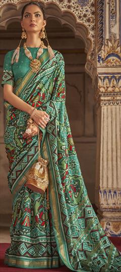 Traditional Green color Saree in Patola Silk, Silk fabric with South Stone work : 1809531