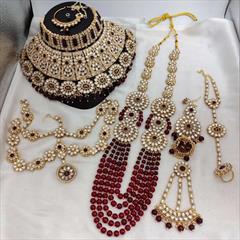 Red and Maroon color Bridal Jewelry in Metal Alloy studded with CZ Diamond, Kundan & Gold Rodium Polish : 1918831