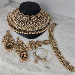 Beige and Brown color Bridal Jewelry in Brass studded with CZ Diamond, Pearl & Gold Rodium Polish : 1931987