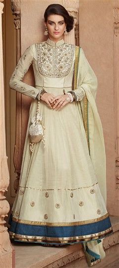 474531 Beige and Brown  color family Anarkali Suits in Tussar Silk fabric with Lace, Machine Embroidery, Stone, Thread work .