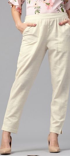 601052 White and Off White  color family Jeggings in Cotton fabric with Thread work .
