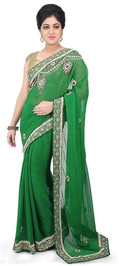 734243 Green  color family Party Wear Sarees in Georgette fabric with Moti work   with matching unstitched blouse.