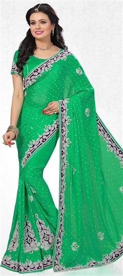 741217 Green  color family Bridal Wedding Sarees, Party Wear Sarees in Georgette fabric with Stone work   with matching unstitched blouse.