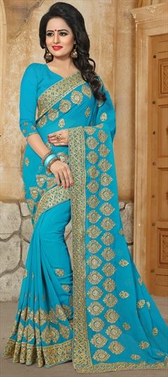 773112 Blue  color family Embroidered Sarees, Party Wear Sarees in Georgette fabric with Machine Embroidery, Stone, Thread, Zari work   with matching unstitched blouse.
