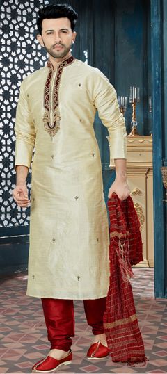 Gold color Kurta Pyjamas in Art Dupion Silk fabric with Embroidered, Stone, Thread work