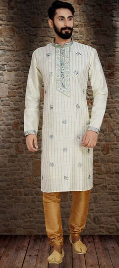 Beige and Brown color Kurta Pyjamas in Dupion Silk fabric with Thread work
