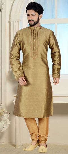 Gold color Kurta Pyjamas in Dupion Silk fabric with Thread work