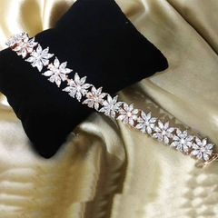 Gold Rodium Polish White and Off White color Bracelet in Copper studded with Austrian diamond, CZ Diamond