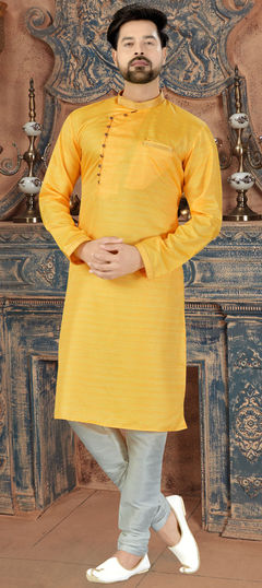 Yellow color Kurta Pyjamas in Dupion Silk fabric with Thread work