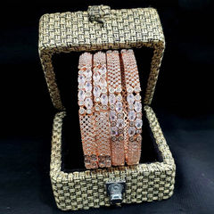 Gold Rodium Polish Beige and Brown color Bangles in Metal Alloy studded with CZ Diamond