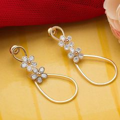Gold Rodium Polish White and Off White color Earrings in Metal Alloy studded with CZ Diamond