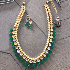 Gold Rodium Polish Green, White and Off White color Necklace in Metal Alloy studded with Kundan