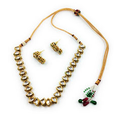 Gold Rodium Polish White and Off White color Necklace in Metal Alloy studded with Kundan