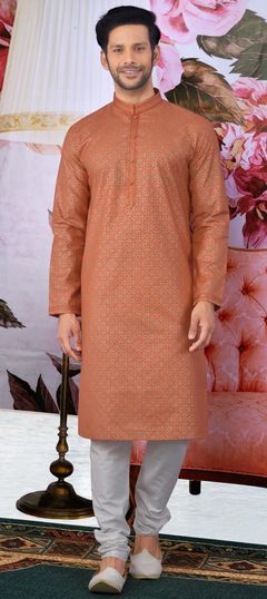 Orange color Kurta Pyjamas in Cotton fabric with Printed work