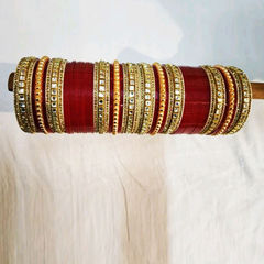 Gold Rodium Polish Red and Maroon color Bangles in Metal Alloy studded with CZ Diamond