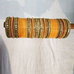 Gold Rodium Polish Yellow color Bangles in Metal Alloy studded with CZ Diamond