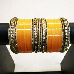 Gold Rodium Polish Yellow color Bangles in Metal Alloy studded with CZ Diamond