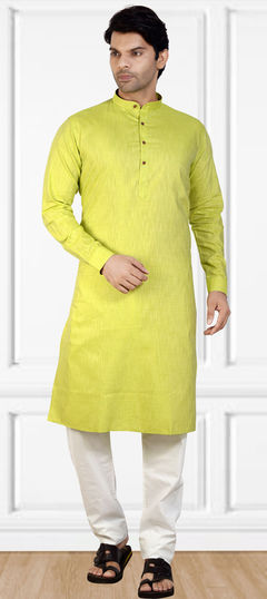 Green color Kurta Pyjamas in Cotton fabric with Thread work