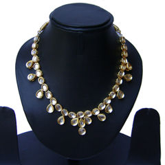 Gold Rodium Polish White and Off White color Necklace in Metal Alloy studded with Kundan