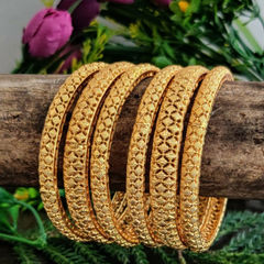 Gold Rodium Polish Gold color Bangles in Copper, Metal Alloy studded with Artificial