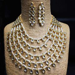 Gold Rodium Polish White and Off White color Necklace in Metal Alloy studded with Kundan