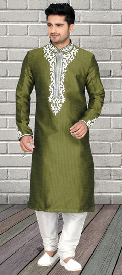 Green color Kurta Pyjamas in Dupion Silk fabric with Embroidered, Thread work