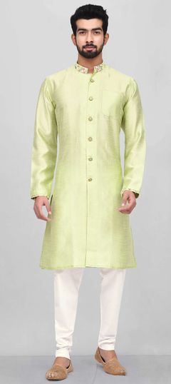 Green color Kurta Pyjamas in Dupion Silk fabric with Thread work