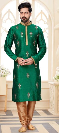 Green color Kurta Pyjamas in Dupion Silk fabric with Embroidered, Thread work