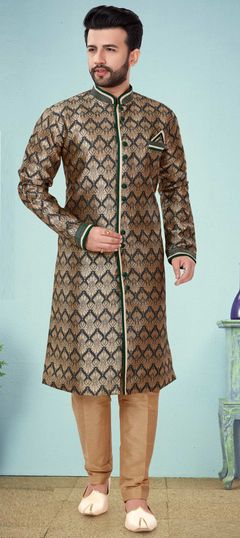 Green color Kurta Pyjamas in Jacquard fabric with Weaving work