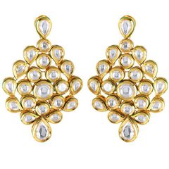 Gold Rodium Polish White and Off White color Earrings in Metal Alloy studded with Kundan