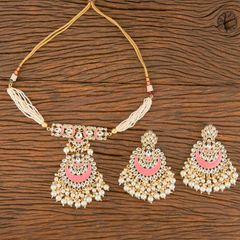 Gold Rodium Polish Pink and Majenta, White and Off White color Necklace in Brass studded with Beads, Cubic Zirconia, Kundan, Pearl