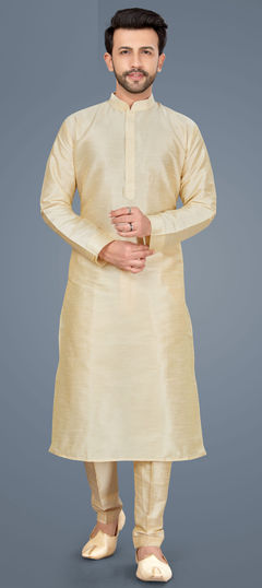 Gold color Kurta Pyjamas in Art Silk fabric with Thread work