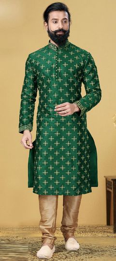 Green color Kurta Pyjamas in Dupion Silk fabric with Embroidered, Thread work