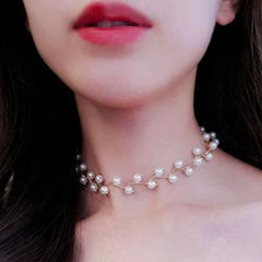 Gold Rodium Polish White and Off White color Necklace in Metal Alloy studded with Pearl