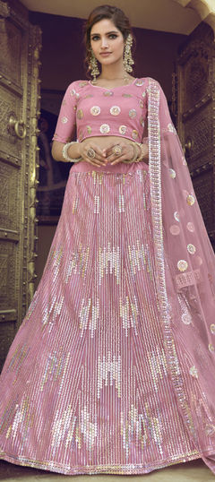 Pink and Majenta color Lehenga in Net fabric with Sequence work