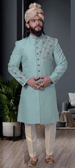 Blue color Sherwani in Jacquard fabric with Embroidered, Weaving work