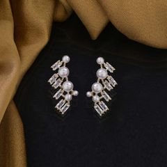 Gold Rodium Polish White and Off White color Earrings in Brass studded with Austrian diamond