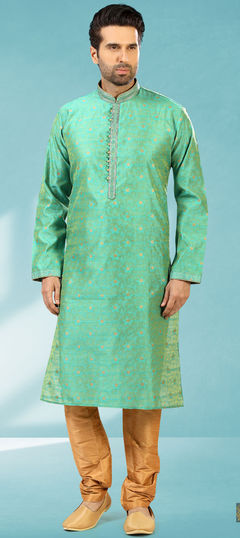 Green color Kurta Pyjamas in Jacquard fabric with Lace work