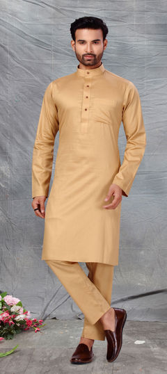 Gold color Kurta Pyjamas in Cotton fabric with Thread work