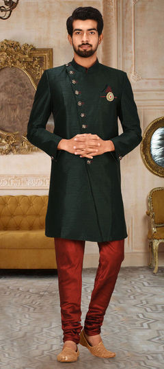 Green color Kurta Pyjamas in Art Dupion Silk fabric with Broches, Thread work