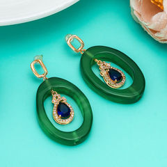 Gold Rodium Polish Green color Earrings in Metal Alloy studded with Crystal