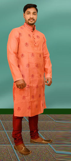 Orange color Kurta Pyjamas in Cotton fabric with Thread work