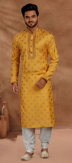 Yellow color Kurta Pyjamas in Cotton fabric with Lace, Printed work