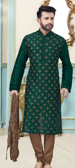 Green color Kurta Pyjamas in Dupion Silk fabric with Embroidered, Thread work