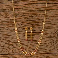 Gold Rodium Polish Gold, White and Off White color Necklace in Brass studded with Beads, Cubic Zirconia